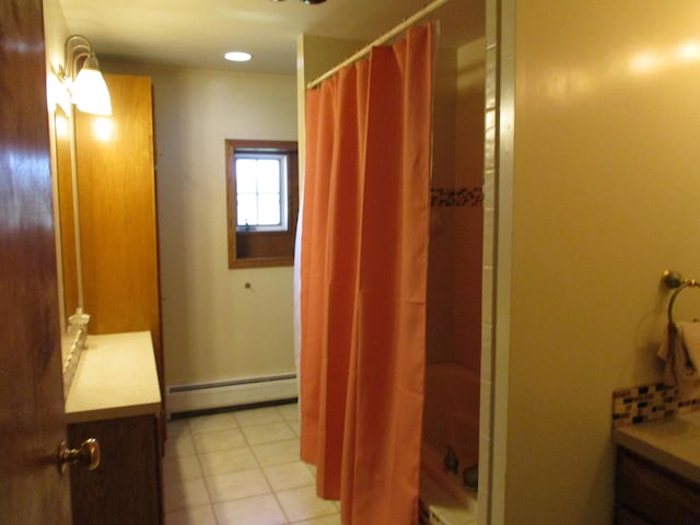 full bath with tile patterned floors, a baseboard radiator, vanity, and a shower with curtain