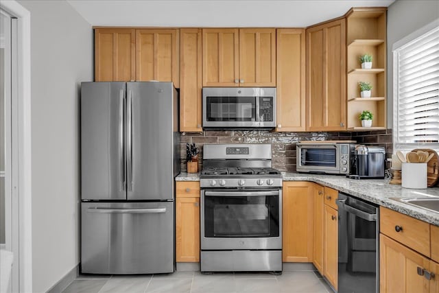 kitchen with open shelves, appliances with stainless steel finishes, light stone countertops, decorative backsplash, and a toaster