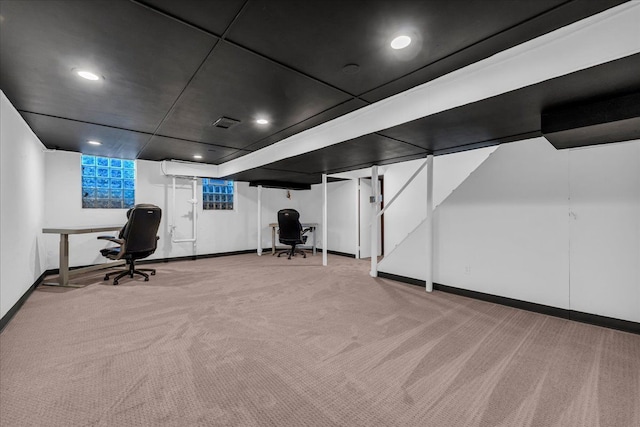 finished basement featuring baseboards, carpet flooring, and recessed lighting