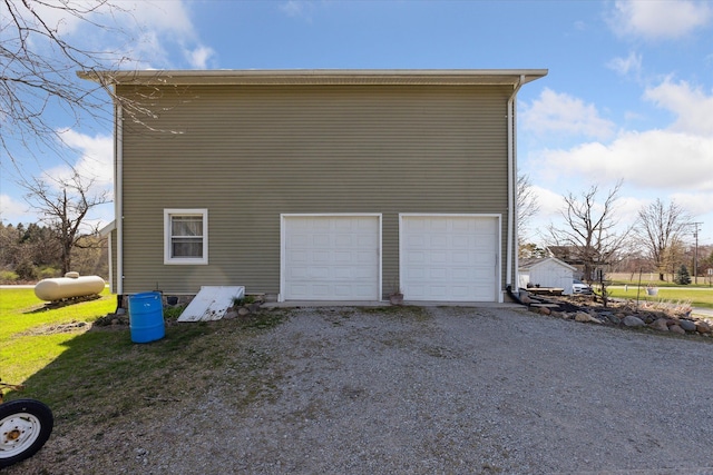 garage with driveway