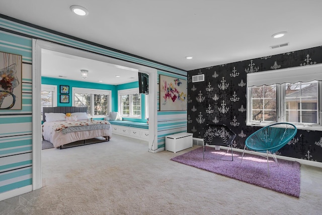 carpeted bedroom featuring recessed lighting, visible vents, wallpapered walls, and baseboards