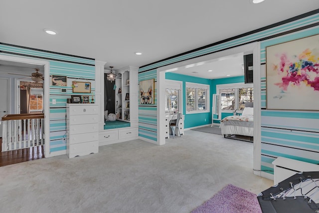 carpeted bedroom with baseboards, recessed lighting, and ornamental molding
