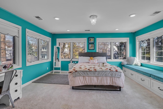 carpeted bedroom with visible vents, recessed lighting, and baseboards