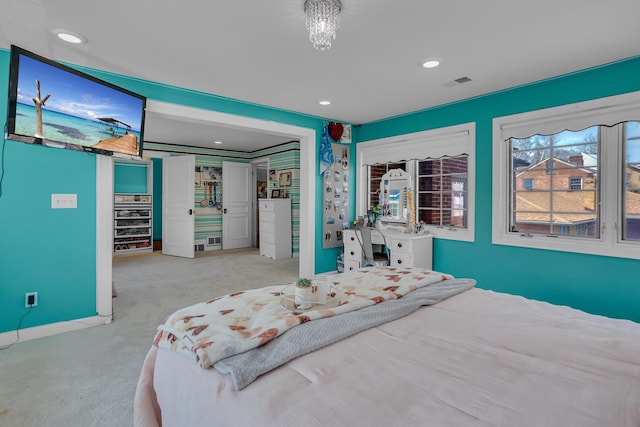 bedroom with baseboards, visible vents, carpet, and recessed lighting