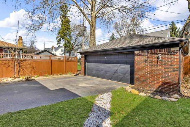 detached garage with fence