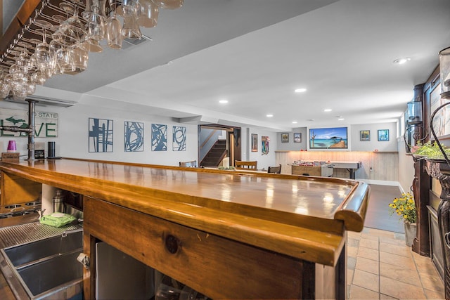 bar with visible vents, recessed lighting, and stairs