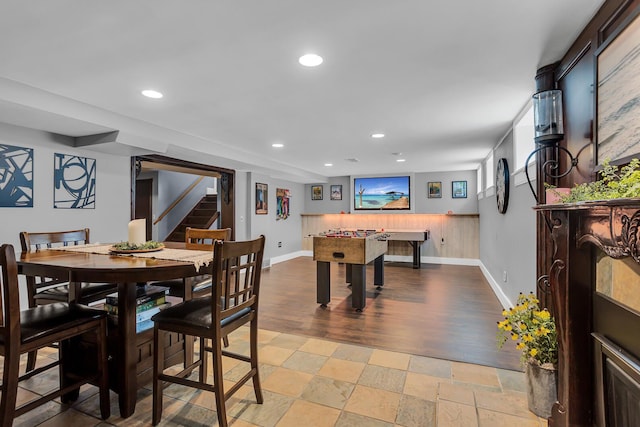 game room with baseboards, recessed lighting, and light wood-style floors