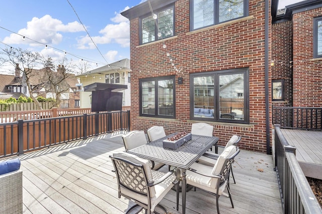 deck featuring outdoor dining space