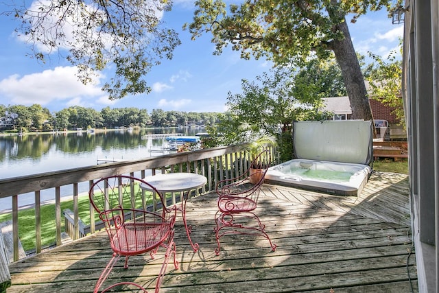 wooden terrace with a water view