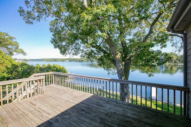 wooden terrace with a water view