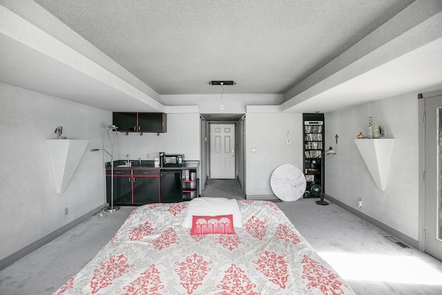 bedroom featuring fridge, concrete floors, a textured ceiling, and baseboards