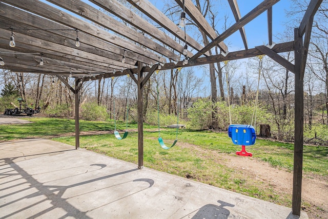 view of patio with a playground and a pergola