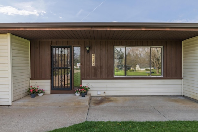 entrance to property with a porch