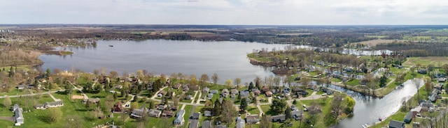 birds eye view of property featuring a residential view and a water view