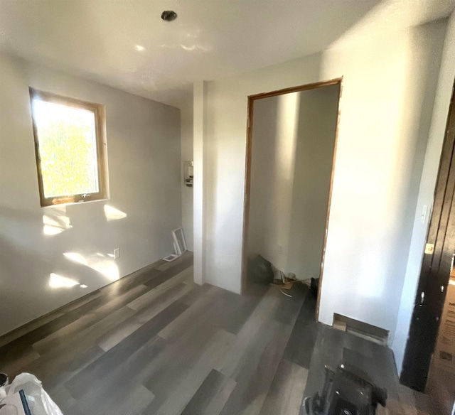 2759 N Dr, Traverse City, MI 49685 - unfurnished bedroom with wood finished floors