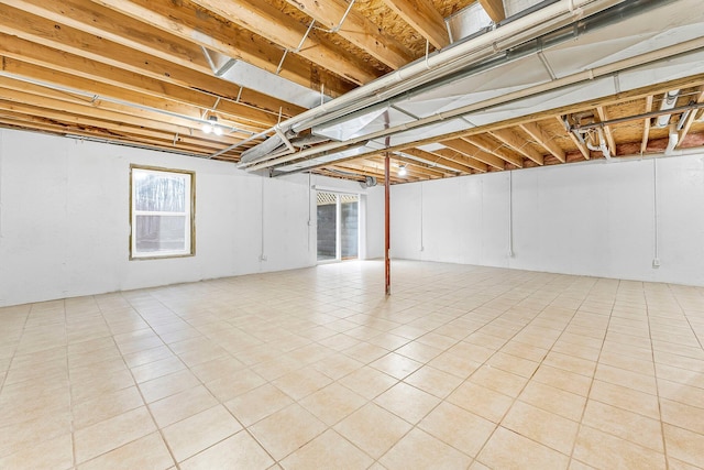 below grade area featuring tile patterned floors