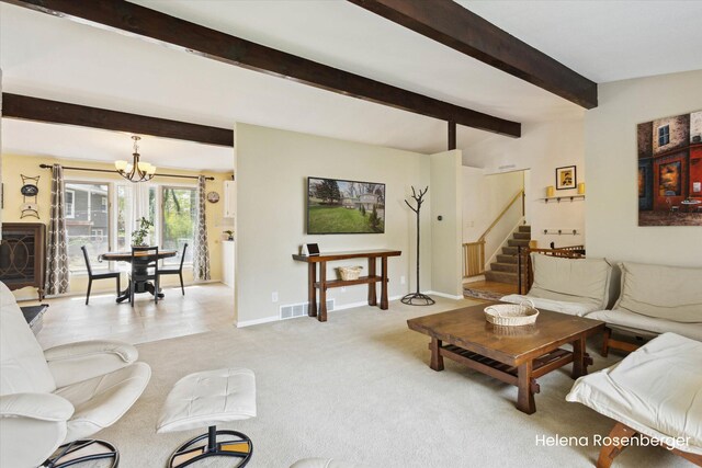 1456 54th St SE, Grand Rapids, MI 49508 - living area with visible vents, baseboards, beamed ceiling, a notable chandelier, and stairs