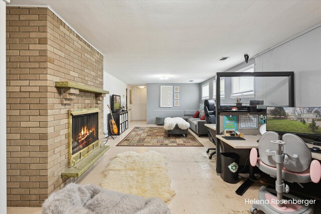 1456 54th St SE, Grand Rapids, MI 49508 - office space featuring visible vents, concrete flooring, and a fireplace