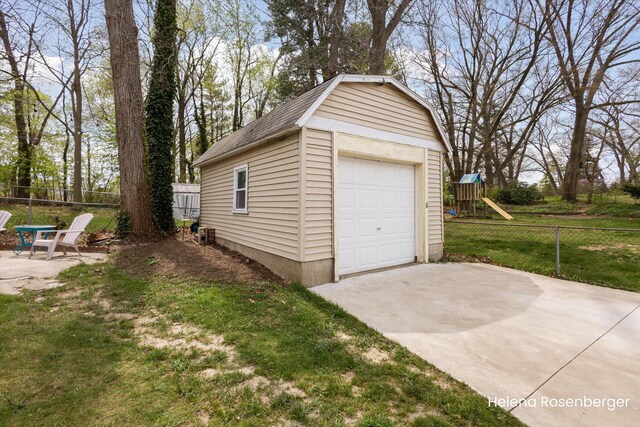 1456 54th St SE, Grand Rapids, MI 49508 - detached garage with fence and driveway