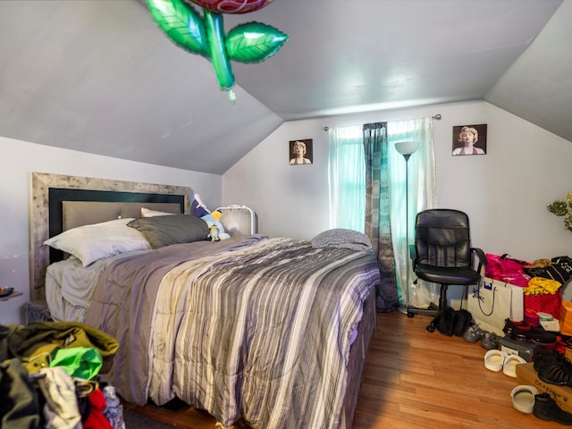 19400 Dwyer St, Detroit, MI 48234 - bedroom with wood finished floors and lofted ceiling