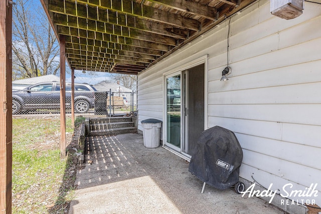 3817 Boone Ave SW, Wyoming, MI 49519 - view of patio / terrace featuring a gate, fence, and area for grilling