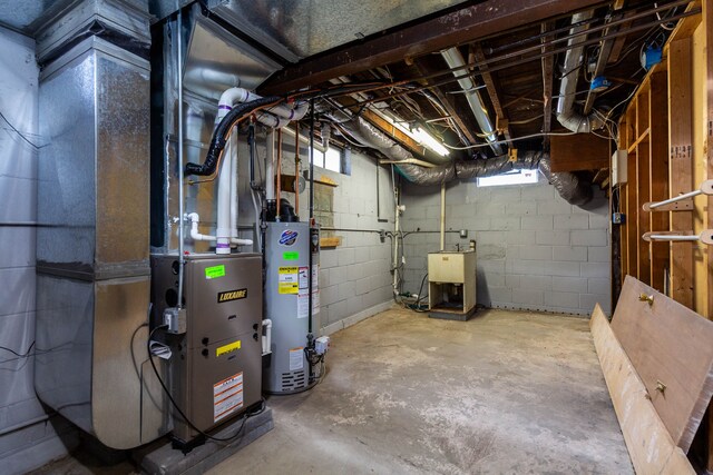 below grade area featuring water heater
