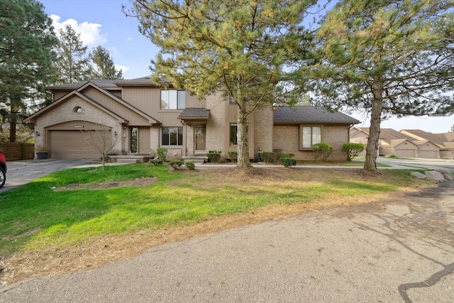 29691 Sierra Pointe Cir, Farmington Hills, MI 48331 - view of front of property featuring a shingled roof, an attached garage, driveway, and brick siding