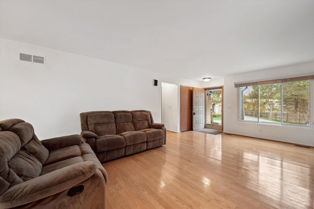 29691 Sierra Pointe Cir, Farmington Hills, MI 48331 - living room with light wood finished floors and visible vents