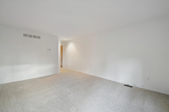 29691 Sierra Pointe Cir, Farmington Hills, MI 48331 - spare room with baseboards, light carpet, and visible vents