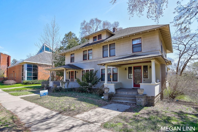 186 W 12th St, Holland, MI 49423 - american foursquare style home with a porch, a shingled roof, and a chimney