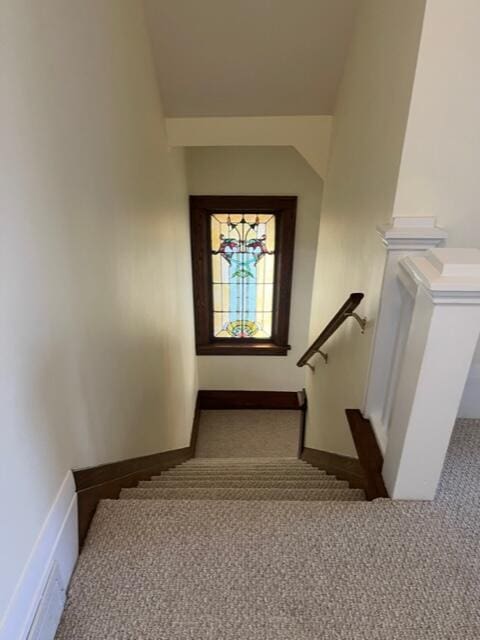 186 W 12th St, Holland, MI 49423 - staircase featuring carpet floors