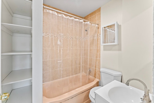 203 E Stewart Ave, Flint, MI 48505 - bathroom featuring toilet, a sink, and shower / bath combo with shower curtain