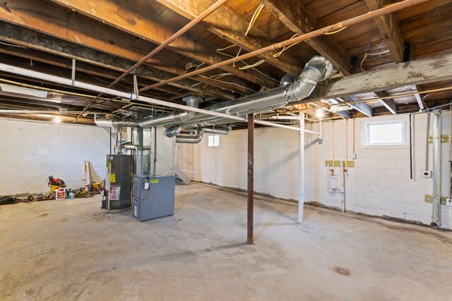 203 E Stewart Ave, Flint, MI 48505 - basement with gas water heater and heating unit