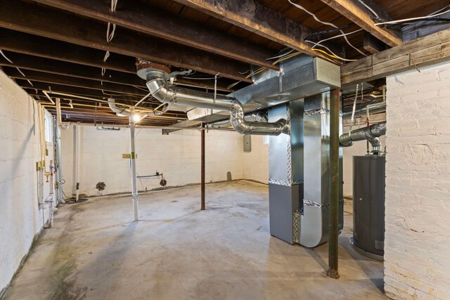 203 E Stewart Ave, Flint, MI 48505 - unfinished below grade area featuring gas water heater and heating unit