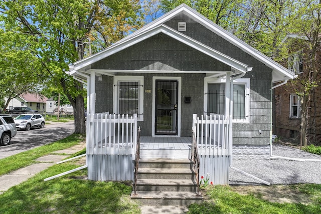 203 E Stewart Ave, Flint, MI 48505 - view of front facade with a porch
