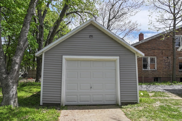 203 E Stewart Ave, Flint, MI 48505 - detached garage featuring driveway
