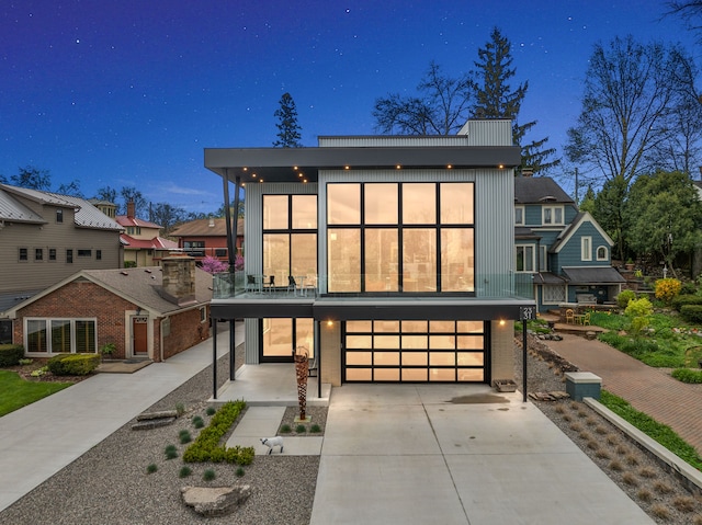 view of front of home with an attached garage and driveway