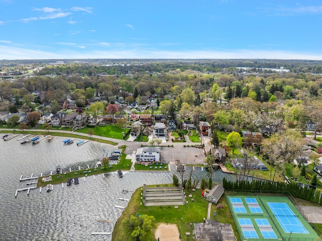 aerial perspective of suburban area featuring a nearby body of water