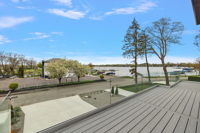 deck featuring a water view