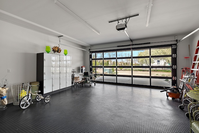 garage featuring a garage door opener