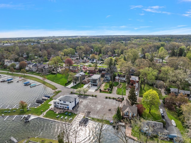 aerial view of residential area with a nearby body of water