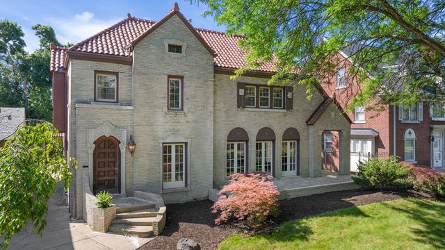 2423 Chicago Blvd, Detroit, MI 48206 - rear view of house with a tile roof