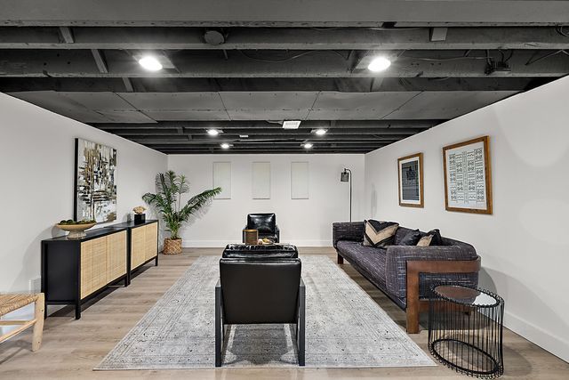 2423 Chicago Blvd, Detroit, MI 48206 - living room with light wood-type flooring and baseboards