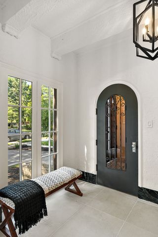 2423 Chicago Blvd, Detroit, MI 48206 - interior space featuring arched walkways and french doors