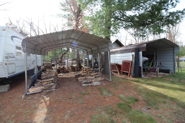 view of yard featuring a carport