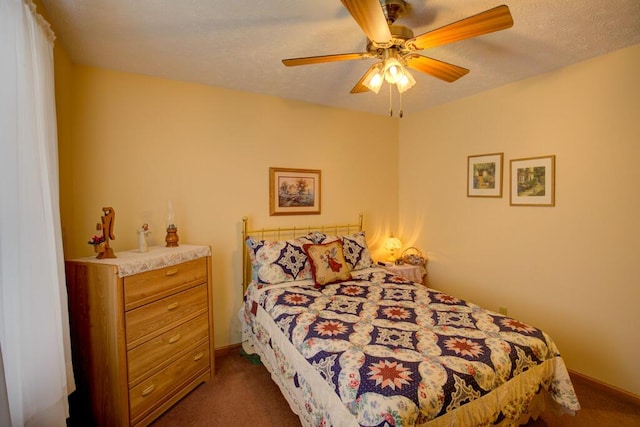 1414 Plains Rd, Leslie, MI 49251 - bedroom with dark carpet, a textured ceiling, and ceiling fan