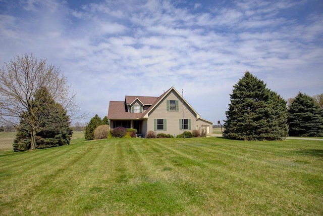 1414 Plains Rd, Leslie, MI 49251 - view of front facade featuring a front yard