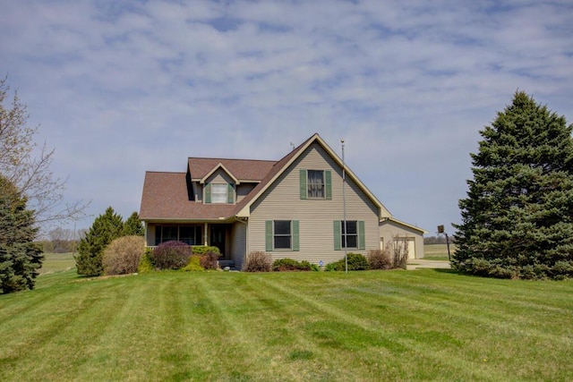 1414 Plains Rd, Leslie, MI 49251 - view of front facade with a front yard and a garage