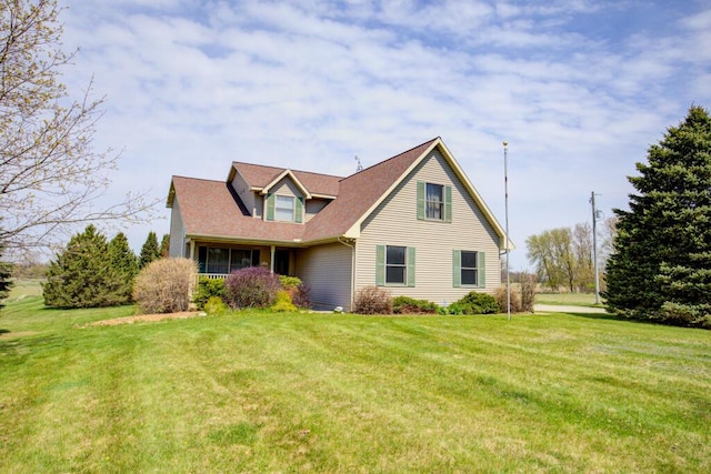 1414 Plains Rd, Leslie, MI 49251 - view of front of property with a front lawn and roof with shingles