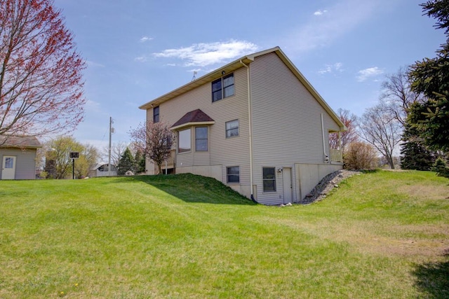1414 Plains Rd, Leslie, MI 49251 - back of house with a yard